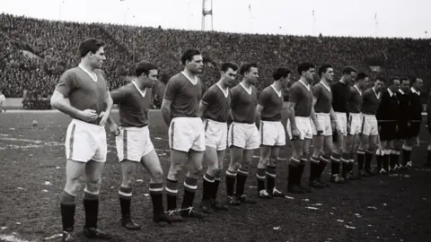 Getty Images The Busby Babes line up for what would be their final ever match - versus Red Star Belgrade in the quarter-final of the European Cup in 1958.