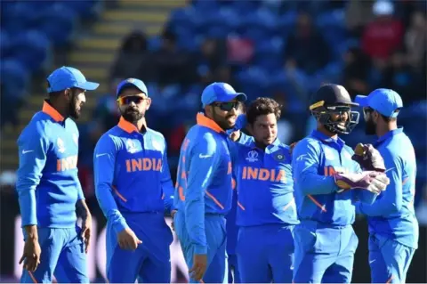 AFP India"s Kuldeep Yadav (C) celebrates with teammates after taking the wicket of Bangladesh"s Mushfiqur Rahim for 90 during the 2019 Cricket World Cup warm up match between Bangladesh v India at Sophia Gardens stadium in Cardiff, south Wales, on May 28, 2019