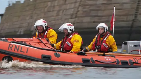 BBC Crew in lifeboat