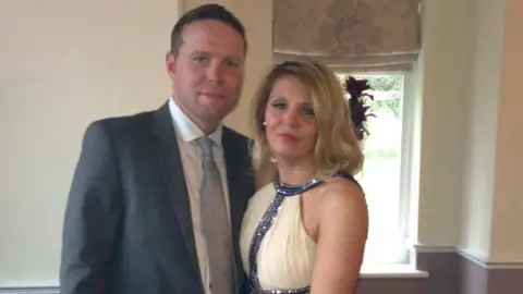 West Mercia Police/Family Handout Derek Whyteside next to his partner