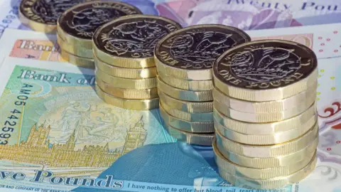 Getty Images Coins and money