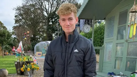 Rhys James Rhys James outside his family home