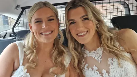 Hampshire Constabulary Two brides in the back of a police car