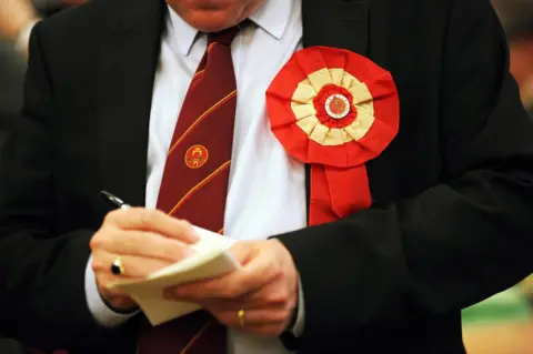 Legakis/REX/Shutterstock A Labour party representative takes notes of the counting of the ballots UK General Election, polling day, results, Swansea, Wales