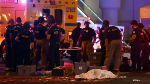 Getty Images Police and emergency workers in Las Vegas on 1 October 2017