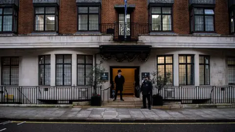 Getty Images Police officers stationed outside the hospital in Marylebone