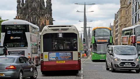 Getty Images Buses and cars on Edinburgh's Princes Street