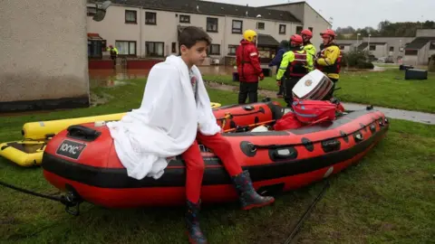 Boy evacuated after flood