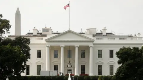 Reuters Flag at White House flying full-staff