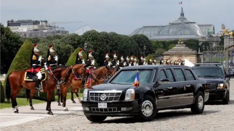 Reuters The motorcade carrying US President Donald Trump arrives at Les Invalides museum in Paris, France, 13 July 2017