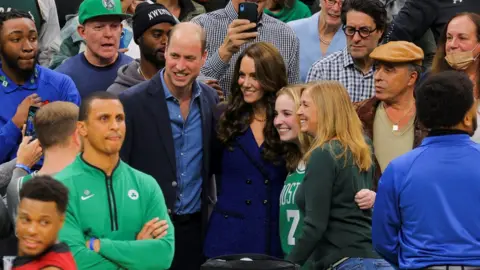 Reuters Prince William and Catherine posed for photographs with some basketball fans.