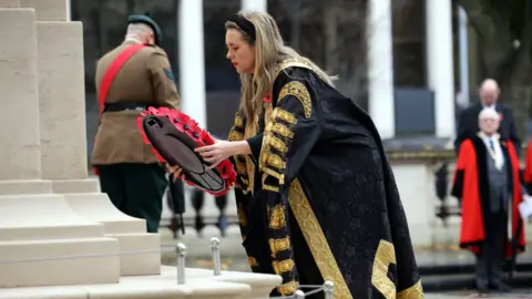 Pacemaker Lord Mayor of Belfast Kate Nicholl lays a wreath in Belfast