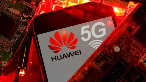 Reuters The Huawei and 5G logos are seen amid a pile of glowing red printed circuit boards (PCBs)