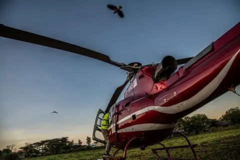 Georgina Smith/BBC Helicopter on the ground