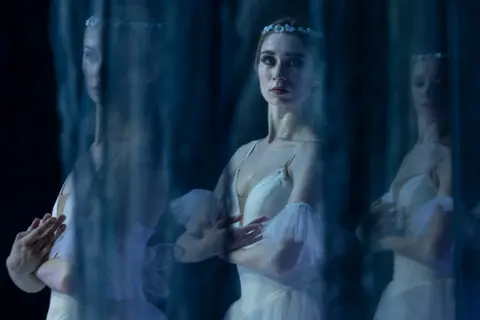 Paula Bronstein / Getty Images Ballet dancers are seen onstage during the performance of Giselle on June 10, 2022 in Lviv, Ukraine.