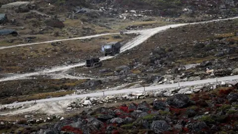 Getty Images Indian army trucks on road to Tawang, 2021