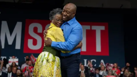 Getty Images Tim Scott hugs his mother Frances