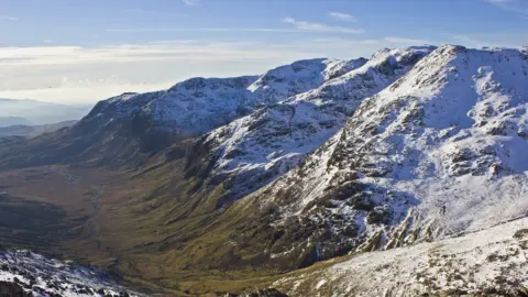 Terry Abraham The Scafells pictured from Esk Pike in winter