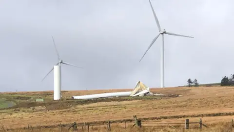 Gerald Keogh A broken wind turbine, snapped and blades crushed