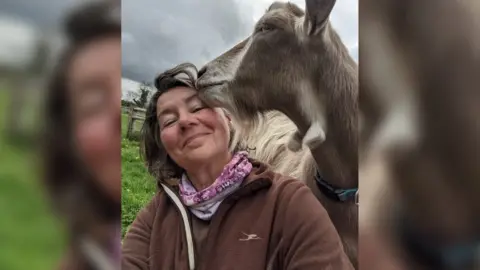 Sue Sabin Sabin and goat