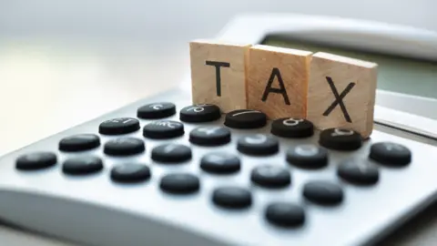 Getty Images Tax and calculator graphic