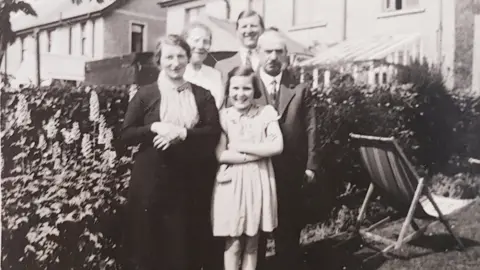 NI War Memorial Anna (left) and her husband Billy (back right) survived while Harriette, Dorothy and Billy were killed along with Dot and Isa