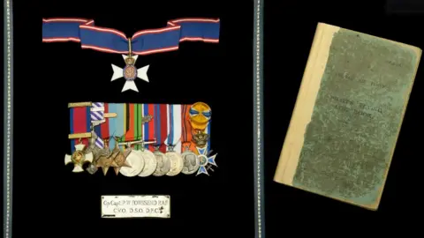 Dix Noonan Webb Group Captain Peter Townsend's medals and flying log book.