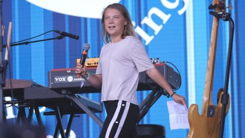 Greta Thunberg delivers a climate warning at Glastonbury - BBC News