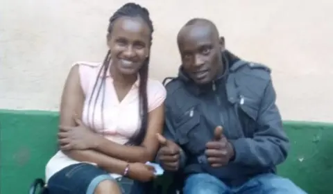 Wanja Mwaura Wanja and Hinga, who is giving thumbs up sign and looking happy sitting on chairs at rehab centre.