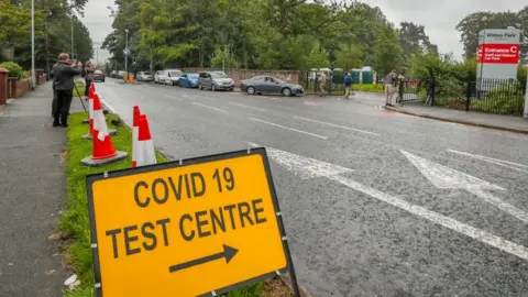 PA Media A mobile testing centre at Witton Park High School in Blackburn and Darwen,