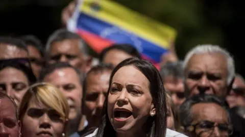 Venezuelan opposition leader Maria Corina Machado speaks to the press during an event, in Caracas, Venezuela, 29 January 2024