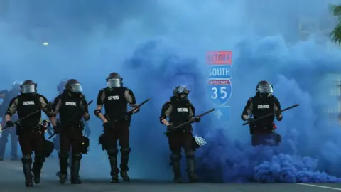 Getty Images Police officers responding to protests in 2020 (FILE)
