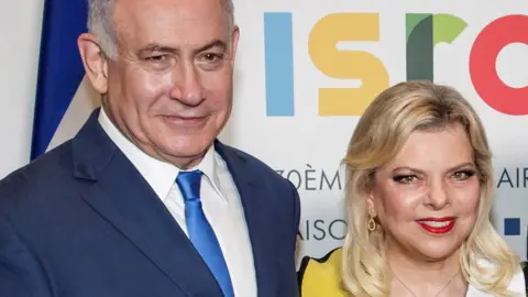 Reuters Israeli Prime Minister Benjamin Netanyahu with his wife Sara pose during an event in Paris, 5 June 2018