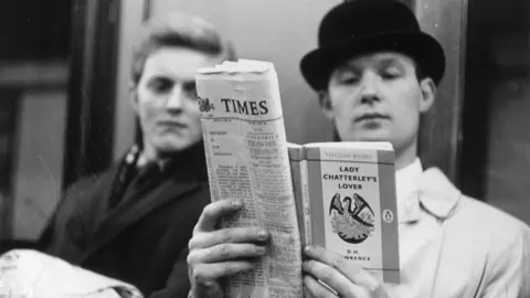 Getty Images A man reading Lady Chatterley's Lover