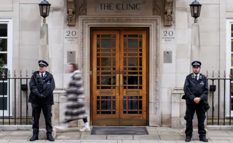EPA Police officers stand outside the London Clinic private hospital, where Britain's Catherine Princess of Wales is recovering from a planned abdominal surgery in London, Britain, 17 January 2024