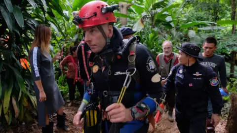 Linh Pham/Getty Images Richard Stanton walks out from Tham Luang Nang Non cave in Thailand