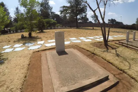 CWGC Kairokor cemetery in Nairobi where cow hides surround the memorial.