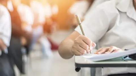 Getty Images generic image of pupil sitting exam in hall