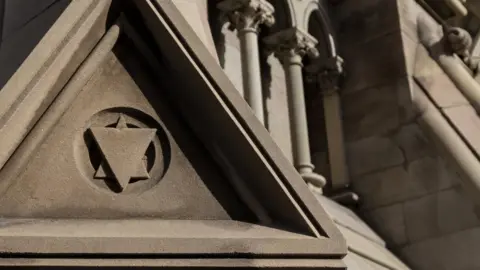 Getty Images The Star of David carved in on the Albert Memorial Clock at Queen's Square in Belfast