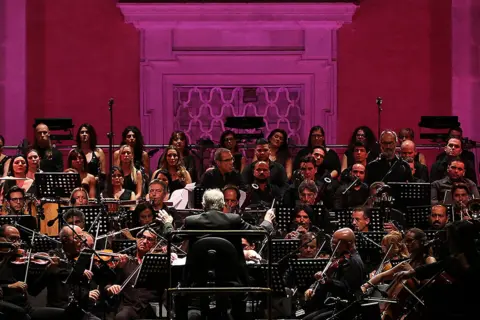 Getty Images Ennio Morricone conducts the Orchestra Roma Sinfonietta in 2017