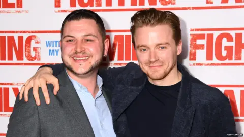 Getty Images Wrestler Zak Bevis with actor Jack Lowden