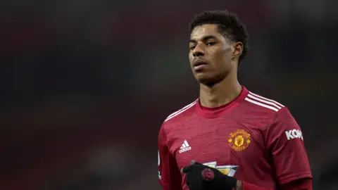 PA Media Marcus Rashford playing for Manchester United