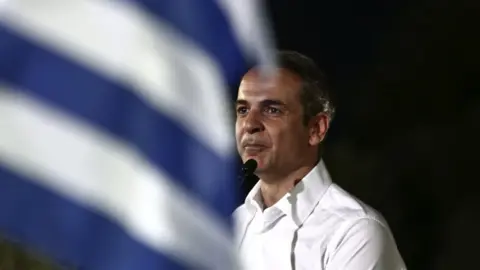 Getty Images Kyriakos Mitsotakis, speaks during a pre-election rally on 4 July