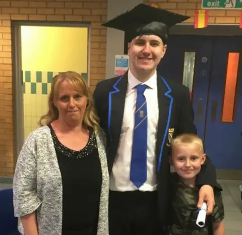 Family handout Lyndsey Baxter with Cayden and brother Scott