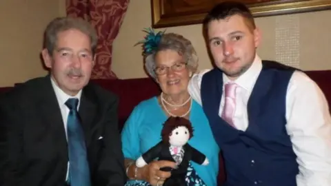 Family photo John, wife Gwenda Griffiths and grandson Rhun Jones