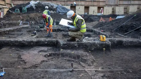 Archaeologists on site