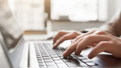 Getty Images Person typing