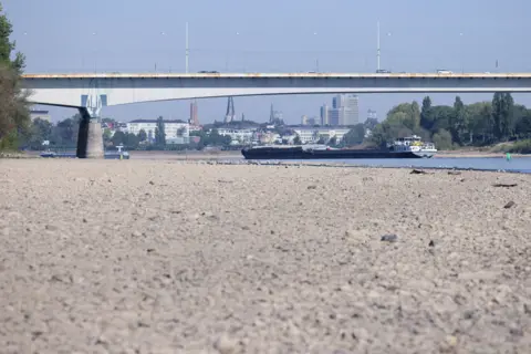 Getty Images A cargo ship travels on the Rhine on August 10, 2022 in Bonn, Germany.