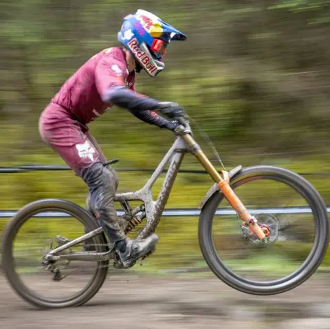 PA Media/Jane Barlow Mountain biker