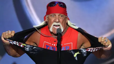 Reuters Hulk Hogan, professional entertainer and wrestler, tears his shirt open as he speaks on Day 4 of the Republican National Convention (RNC), at the Fiserv Forum in Milwaukee, Wisconsin, U.S., July 18, 2024